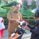 Semarak HUT RI ke-81: Wabup Agam Ajak Warga Kibarkan Merah Putih, Ratusan Bendera Dibagikan