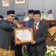 Kontribusi Nyata Pers, Ketua PWI Sumbar Widya Navies Raih PIN Emas di HJK Padang ke-357