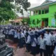Ringankan Beban Wali Murid, 123 Siswa SMPN 11 Padang Dapat 6 Setel Seragam Gratis!