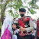 Kabut Asap Karhutla Hantui Padang, Polresta Turun ke Jalan Bagi-Bagi Masker Gratis